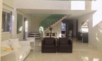 Imagem 3: Casa de condomínio para aluguel e venda possui 460 metros quadrados com 4 quartos