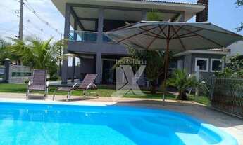 Imagem 5: Casa com 4 dormitórios ( sendo que 01 é suíte)para alugar, 250 m² por R$ 2.5000/dia - Atam