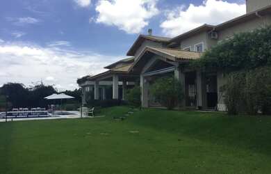 Imagem 2: Casa de condomínio para venda possui 970 metros quadrados com 6 quartos