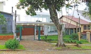 Imagem 2: Casa de três dormitórios, suíte e duas vagas de garagem no bairro Chácara das Pedras em Po