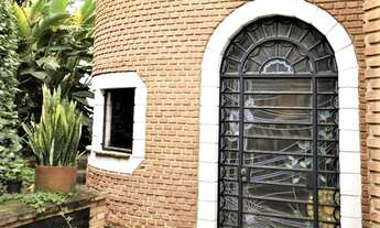 Imagem 6: Casa de condomínio para venda tem 557 metros quadrados com 6 quartos