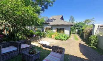 Imagem 4: Casa em lindo terreno alto ao nível da rua medindo 10 × 32 onde consta uma residência térr