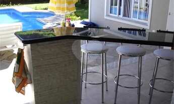 Imagem 5: Casa de alto padrão com 4 dormitórios localizada no condomínio Canada Village com seguranç