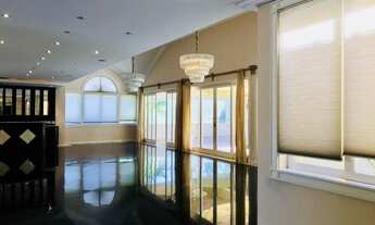 Imagem 5: Casa de condomínio térrea para venda possui 1120 metros quadrados com 5 quartos