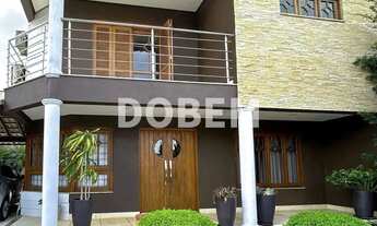 Imagem 4: Residência de Alto Padrão com Piscina e Área Gourmet Completa