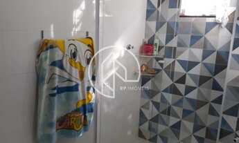 Imagem 3: Casa linear com 3 quartos e varanda ampla com garagem para 8 carros