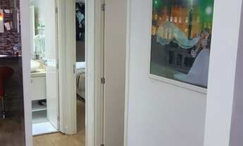 Imagem 7: Ap totalmente mobiliado com coifa, cooktop de indução, forno embutido e pedra de Silestone