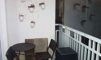 Imagem 3: Ap totalmente mobiliado com coifa, cooktop de indução, forno embutido e pedra de Silestone