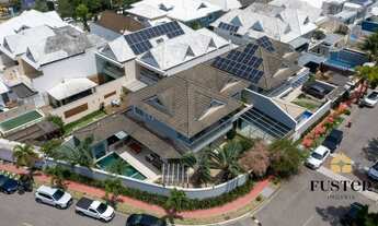 Imagem 2: Casa de condomínio para venda tem 405 metros quadrados com 5 quartos