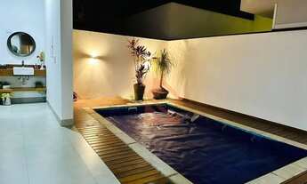 Imagem 7: O terreno possui 250 m², e área construída de 265 m², com 4 vagas sendo 2 cobertas