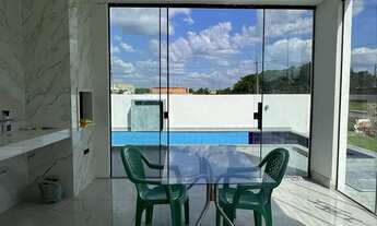 Imagem 5: Casa térrea impecável no Cond. Alphaville, 3 suítes, moderna com piscina por 990 mil