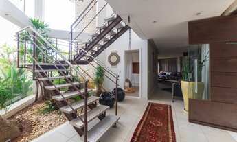 Imagem 3: Casa de condomínio para venda tem 387 metros quadrados com 4 quartos