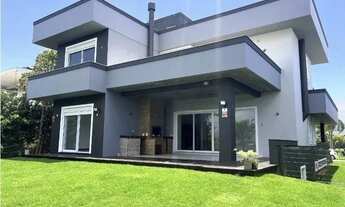 Imagem 5: Casa para Locação em Florianópolis, Campeche, 4 dormitórios, 4 suítes, 6 banheiros, 4 vaga