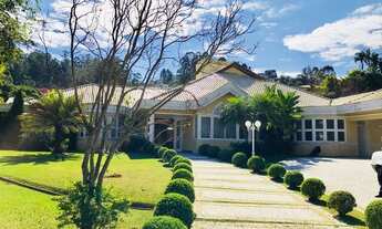 Imagem 3: Casa de condomínio térrea para venda possui 1120 metros quadrados com 5 quartos