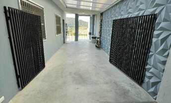 Imagem 2: Sobrado com 3 quartos 1 suíte e porão. Vaga para 6 carros