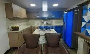 Imagem 7: Casa com 233m², 2 dormitórios sendo 1 suíte, living com lareira, espaço gourmet com churra