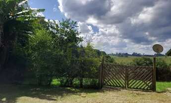 Imagem 2: Descubra seu Refúgio Exclusivo em Pinhais: Chácara no Condomínio Greenfields