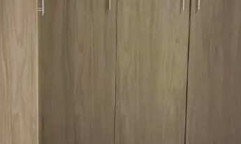 Imagem 3: Kitnet com armários e fogão