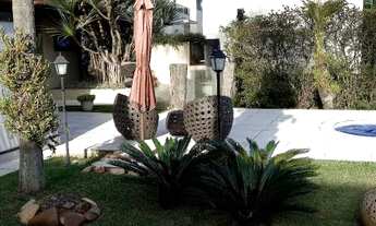 Imagem 6: Casa térrea espetacular abraçada pela Natureza!