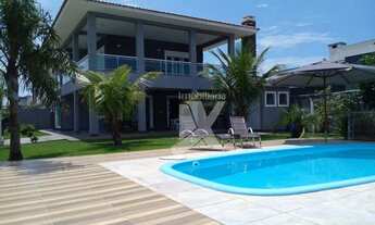 Imagem: Casa com 4 dormitórios ( sendo que 01 é