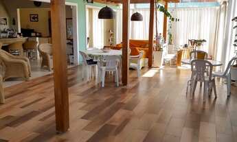 Imagem 3: Casa com Ampla Área de Convivência e Piscina