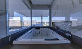 Imagem 6: Casa moderna com área de lazer e ambientes amplos