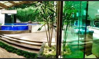 Imagem 4: Casa de condomínio para venda tem 700 metros quadrados com 4 quartos