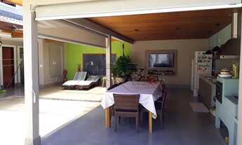 Imagem 5: Casa de condomínio para aluguel e venda possui 400 metros quadrados com 4 quartos