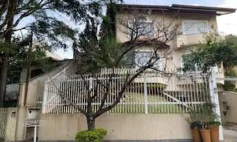 Imagem 2: Casa construída por arquiteta renomada, jardins maravilhosos, espaço magnifico em rua bem