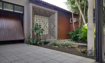 Imagem 2: À Venda uma casa, de três dormitórios e uma suíte, com garagem coberta, Bairro Jardim Sab