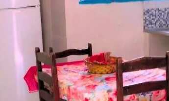 Imagem 6: Refúgio Perfeito com Piscina e Churrasqueira Perto do Mar