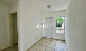 Imagem 5: Casa geminada com portão fechado para locação