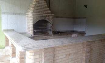 Imagem 5: Casa com piscina e churrasqueira