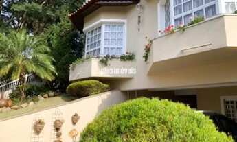 Imagem 4: Casa construída por arquiteta renomada, jardins maravilhosos, espaço magnifico em rua bem