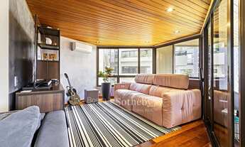 Imagem 6: Apartamento iluminado com planta ampla e vista para área arborizada