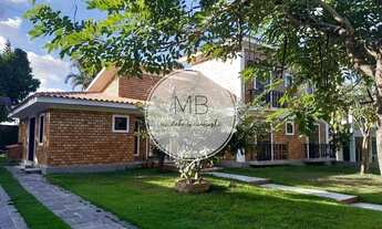 Imagem 2: Casa no KM 9 NA PISTA com piscina privativa, 4 quartos sendo 2 suites