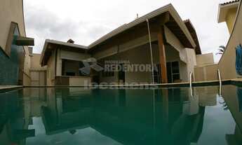 Imagem 2: Casa de 3 dormitórios com churrasqueira e piscina no Condominio Damha II