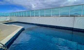 Imagem 2: 3 quartos de frentão, andar alto, a poucos metros do mar