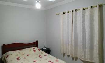 Imagem 3: Casa com piscina e churrasqueira