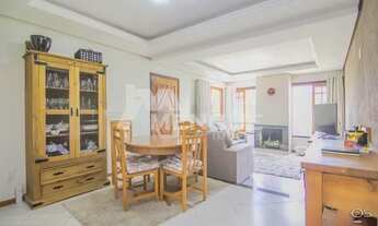 Imagem 2: Casa com 3 dormitórios e 3 vagas de garagem, à venda em Porto Alegre no bairro Jardim Le