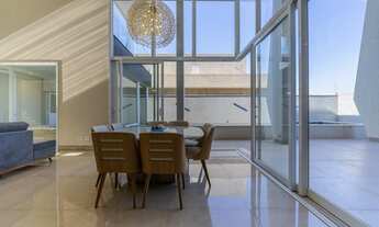 Imagem 2: Casa moderna com área de lazer e ambientes amplos