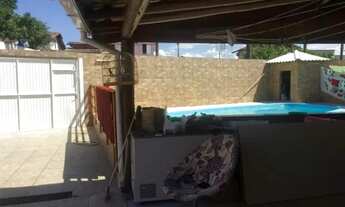 Imagem: Casa (Alvenaria), com 6 quartos e 5 banheiros