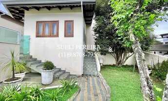 Imagem 6: Casa de condomínio para venda possui 356 metros quadrados com 4 quartos