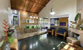 Imagem 6: Casa de condomínio para venda tem 220 metros quadrados com 4 quartos