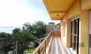 Imagem 3: Residência com vista panorâmica espetacular para o Guaíba em todos os cômodos da casa, hal