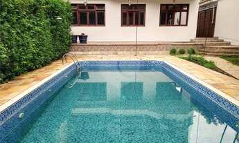 Imagem 3: Belíssima casa com quatro suítes, espaço gourmet e piscina