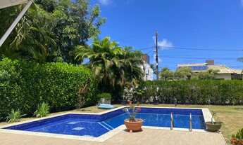 Imagem 2: Casa de condomínio térrea para venda, com 4 suítes e 1 lavabo, tem 375 m2