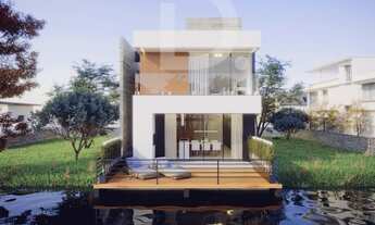 Imagem 2: Casa de condomínio para venda com 228 metros quadrados de fundo para o lago