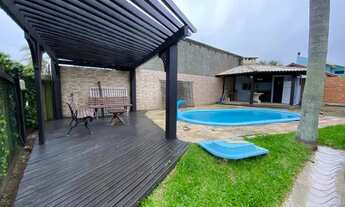 Imagem: Elegance Imóveis Elegante casa com piscina