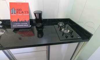 Imagem 6: Flat mobiliado com arrumação de quarto, com cozinha completa com geladeira grande. Sem bur